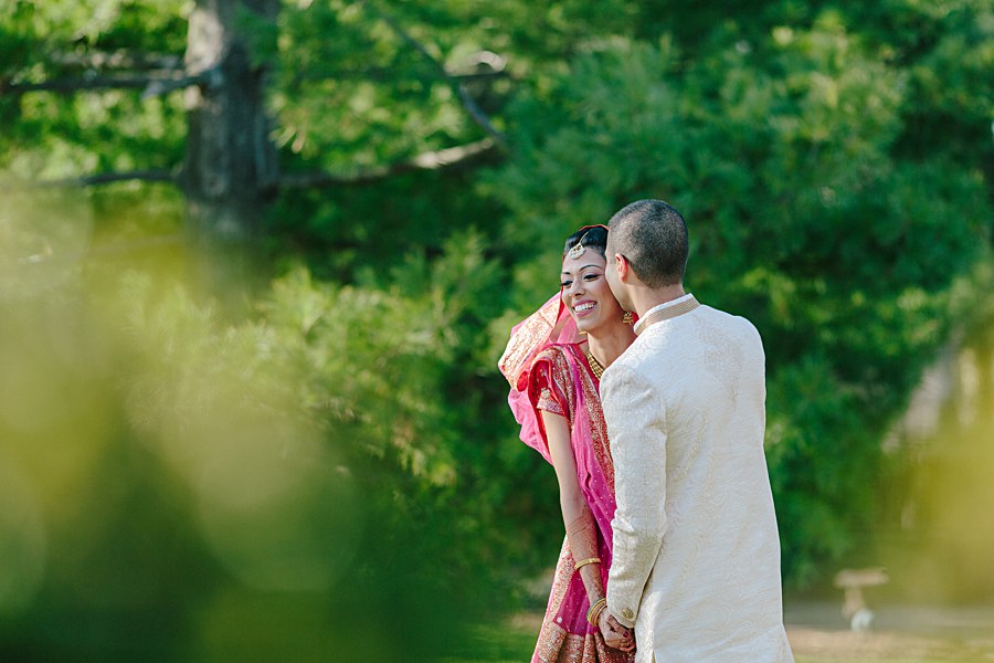 Happy Indian Bride and Groom Wedding Portrait after wedding ceremony