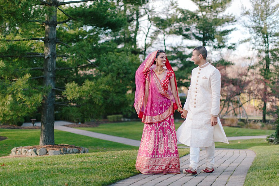 Happy Bride and Groom Wedding Portrait Walking after wedding ceremony